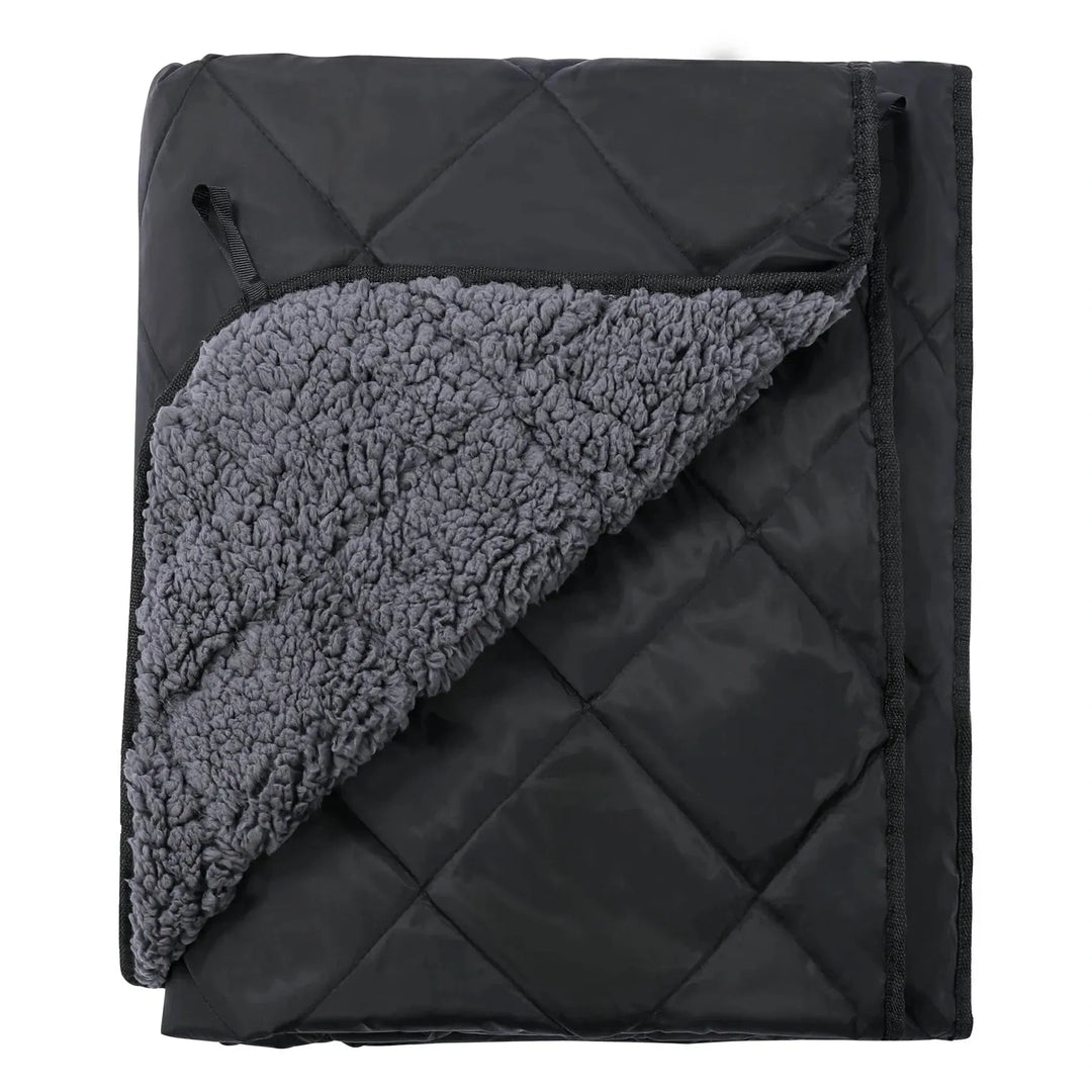  | Black waterproof stadium blanket folded open to show gray Sherpa lining and Oxford exterior