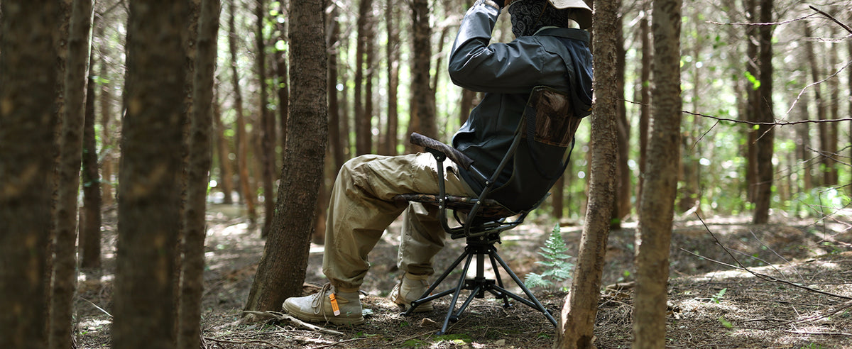 man sit on hunting swivel hunting chair